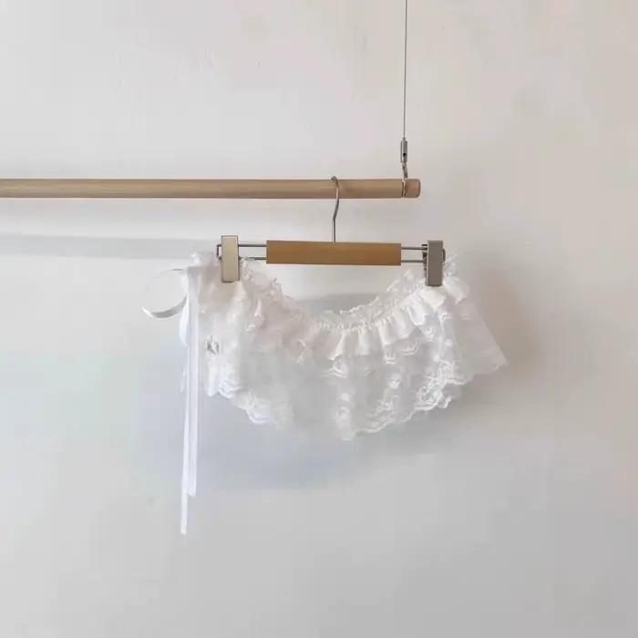 Mini-jupe en dentelle Y2K douce, jupe courte Lolita en gaze, jupe à volants avec bordure fleurie pou