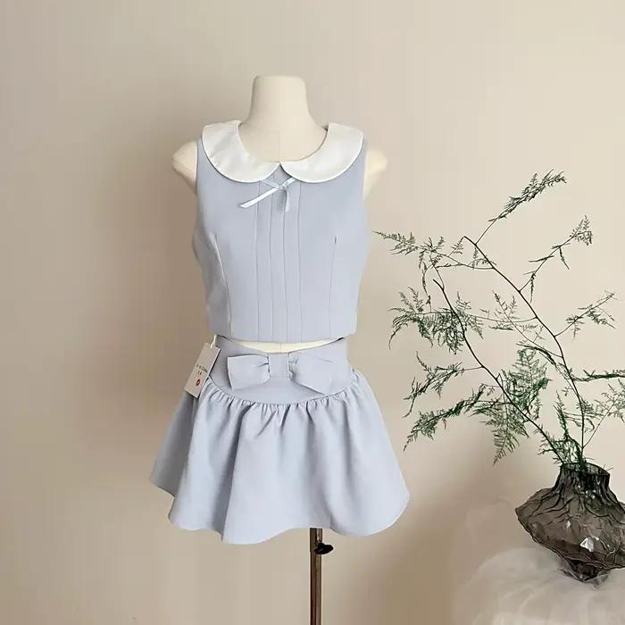 Ensemble jupe deux pièces d'été pour femme, style mignon, avec haut court sans manches à col Peter P