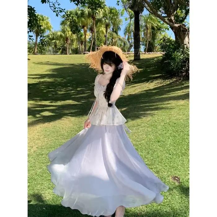 Jupe midi élégante d'été avec grand volant, effet nacré, ambiance féerique, style vacances, mélange 