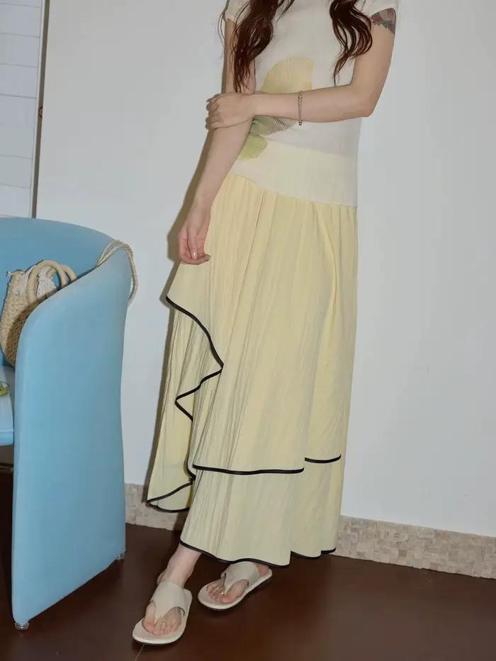 Jupe longue trapèze irrégulière taille haute pour femme, avec bord contrastant jaune, collection été