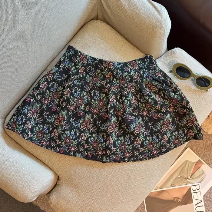 Jupe mini plissée taille haute style rétro français, élégante et populaire, à motif floral, coupe tr