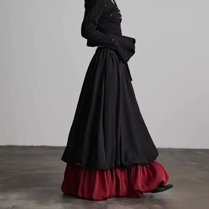 Jupe noire à effet deux pièces pour femme, nouvelle collection printemps, design fluide et amincissa