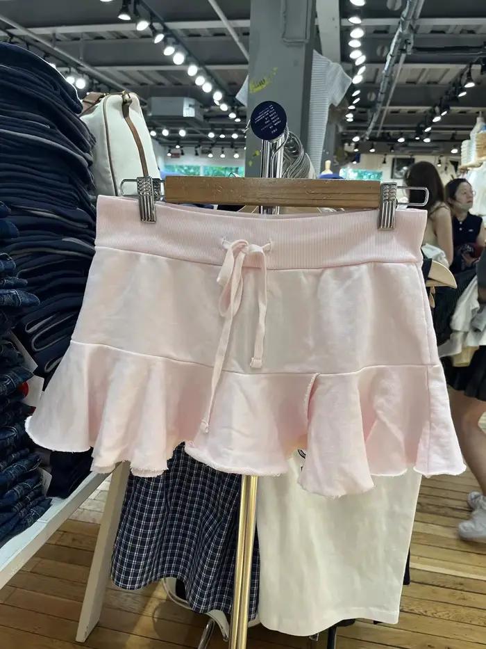 Mini-jupes roses à volants pour femme, style preppy, taille basse, cordon de serrage, ourlet brut, c