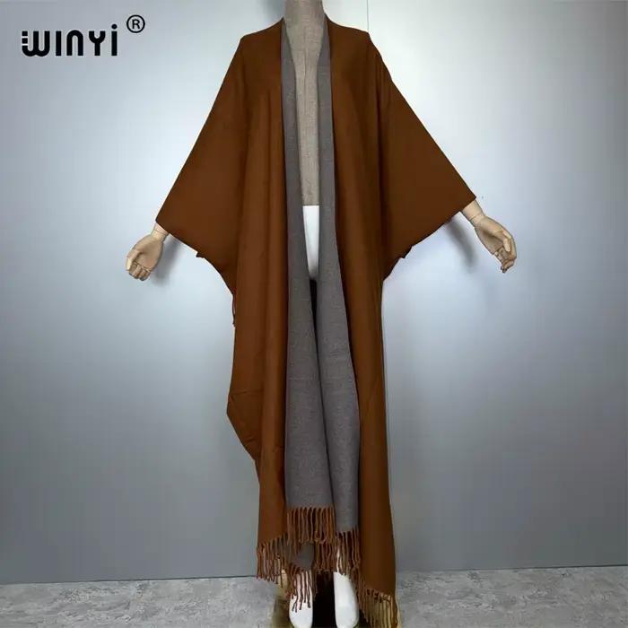 WINYI tenues d'hiver pour femmes de luxe fourrure glands manteau épais confortable chaud couleur uni