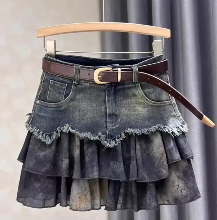 Dames jupes été nouveau personnalisé épicé fille épissé taille haute Denim a-ligne bord brut plissé 