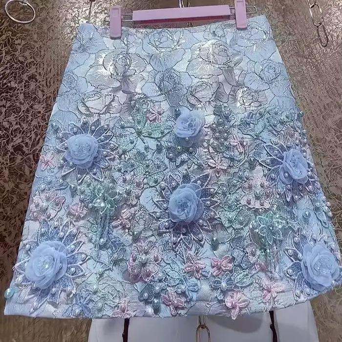 Design de luxe broderie fleurs 3D jupe courte perlée pour femmes pantalons courts jupes tendance mod
