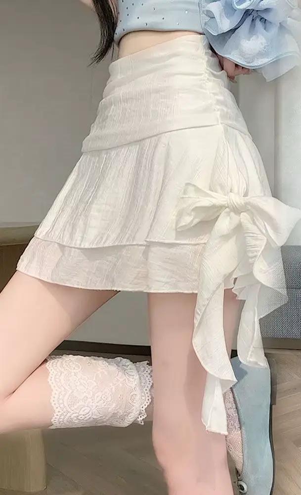 Jupe courte évasée à nœud papillon pour femme, nouvelle collection 2026, taille haute, style Pure De