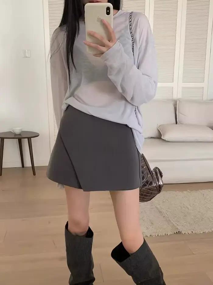 Jupe courte asymétrique taille haute coupe trapèze pour femme, style décontracté amincissant, en tis