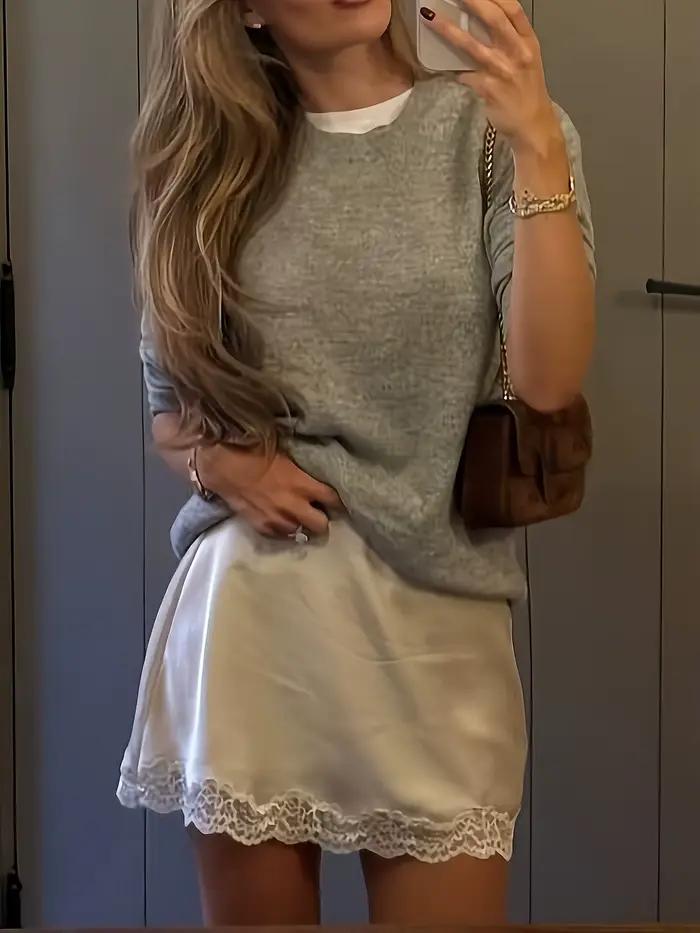 Nouvelle jupe courte abricot pour femme, en dentelle brillante, style pur et sensuel.
