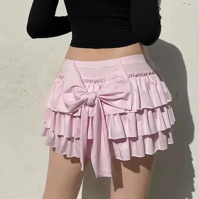 Mini jupes plissées à nœud rose pour femmes, jupes trapèze monochromes, jupes à volants Lolita Kawai