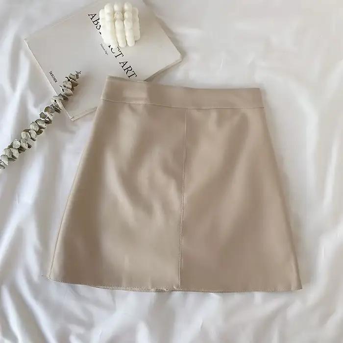 Mini jupe en cuir PU taille haute pour femme, jupes monochromes, fermeture éclair, hanche ronde, chi