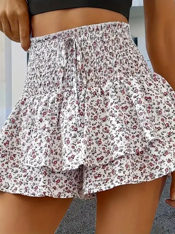 Mini-jupe florale tendance pour femme, décontractée d'été, avec ourlet à volants, taille ajustable, 