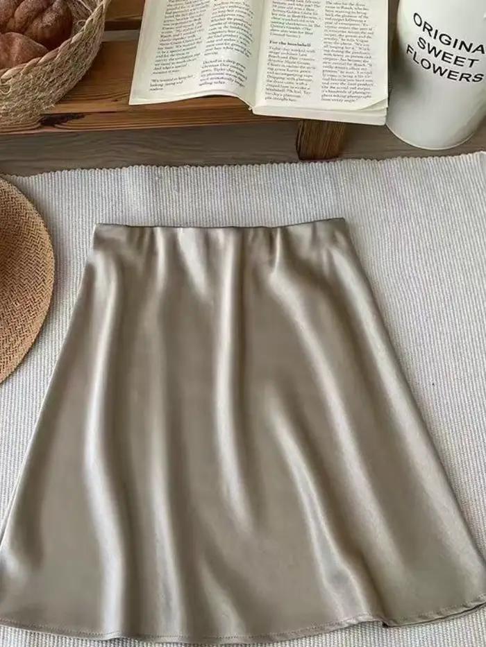 Nouvelle jupe mini élégante en satin taille haute coupe trapèze style coréen couleur champagne pour 