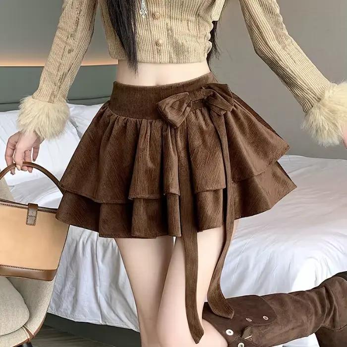 Jupe courte évasée à double couche et volants pour femme, style doux, taille haute avec nœud, collec