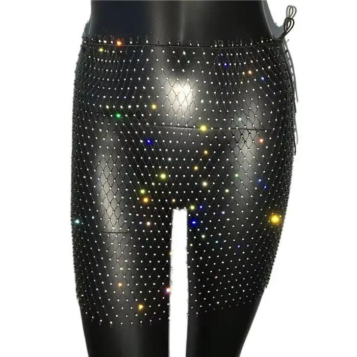 Mini jupe en résille blanche et noire pour femmes, strass scintillants, moulante, ajourée, transpare