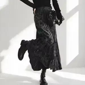 Longue nouvelle jupe automne et hiver jupe taille haute Texture plissée grand ourlet jupe hiver jupe