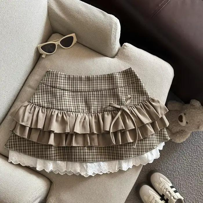 Jupe courte en dentelle superposée 2026 pour femme, style universitaire d'été, petite jupe rétro à c
