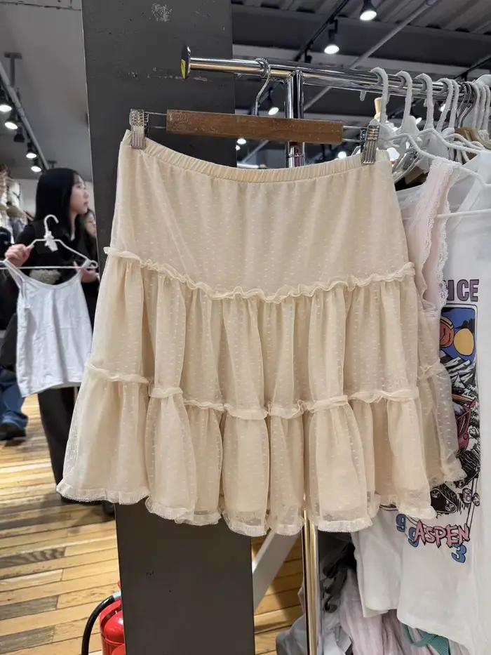 Jupes Jacquard en maille à pois longueur genou pour femme, taille élastique, volants, coupe trapèze,
