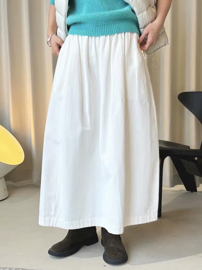 Début du printemps simple taille haute bouton élastique demi-jupe ample minceur décontracté jupe lon