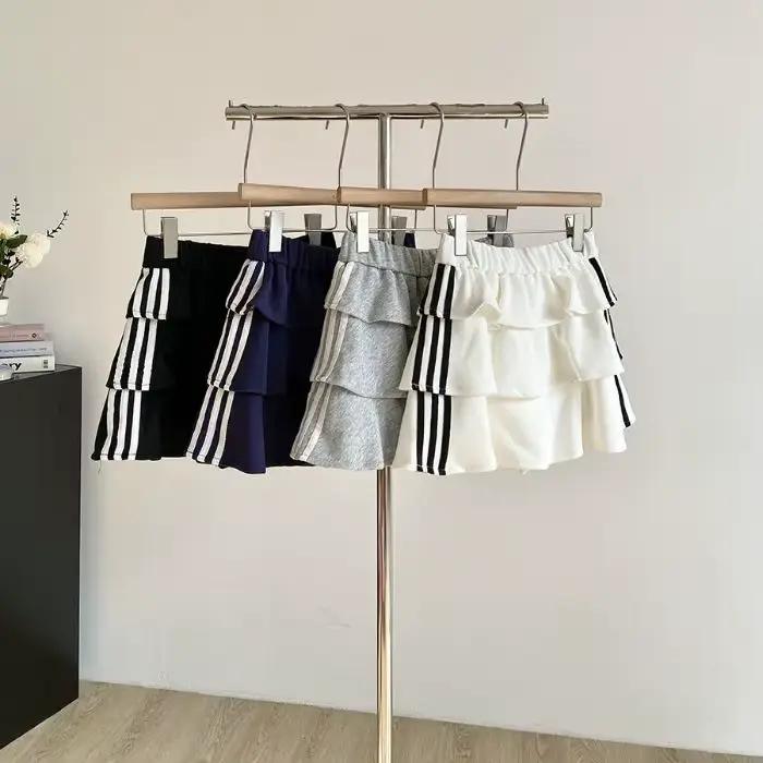 Jupe courte rayée douce pour femme, style été 2026, anti-exposition, jupe bouffante, taille élastiqu