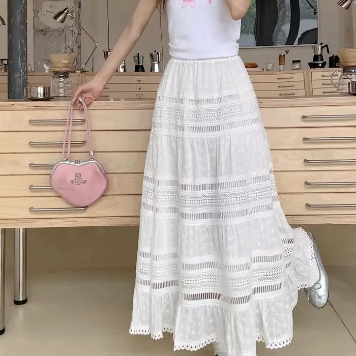 Jupe longue maxi brodée à œillets et découpes en coton blanc semi-transparente fluide pour femme, te