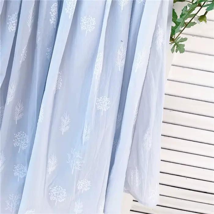 Jupe plissée mi-longue bleue en coton et lin