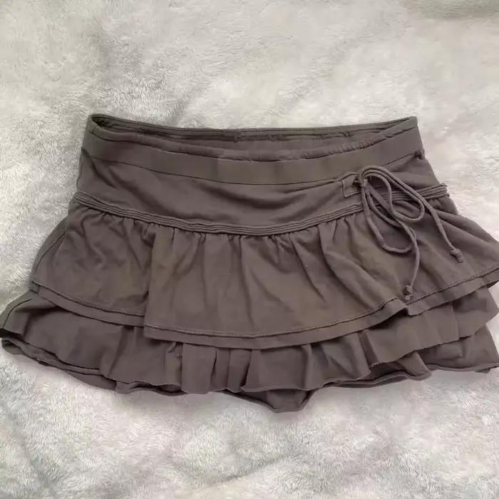Europe léopard Sexy épices filles jupe décontracté Moda mince tout-match court Mujer Faldas champignon gâteau vente chaude Simple jupes à carreaux