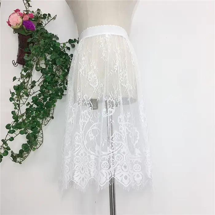 Mini jupe en maille de dentelle transparente pour femmes
