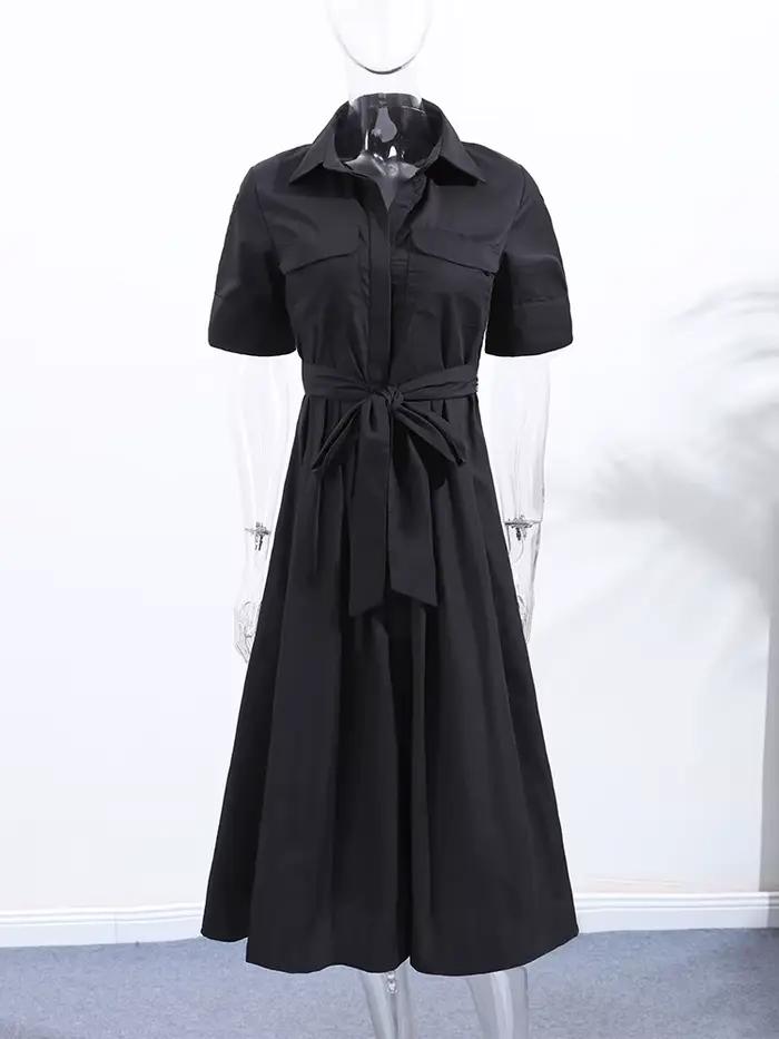 Robe longue élégante noire pour femme avec lacets, manches courtes, poches, ceinture et col rabattu – Collection été 2026 – Coupe ajustée