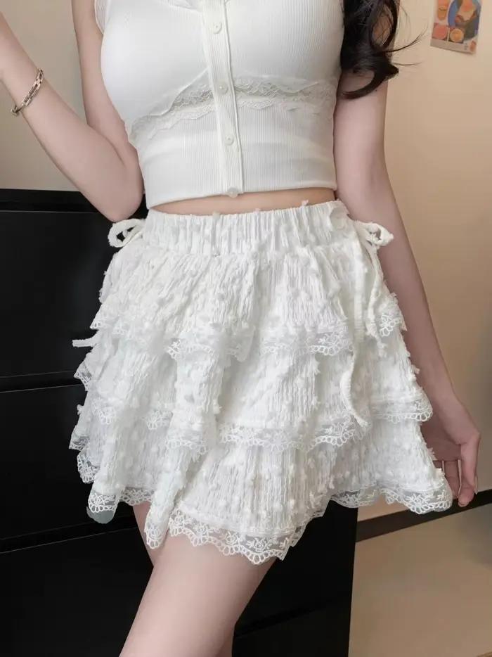 Jupe tutu blanche en dentelle avec nœud pour femme, jupe courte bouffante anti-exposition d'été, taille haute, coupe trapèze ajustée