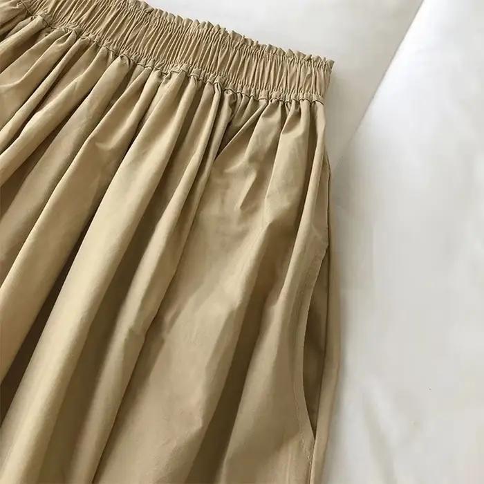 Femmes blanc jupe longue mode poches plissé genou longueur jupes automne 2024 nouveau décontracté élégant taille haute