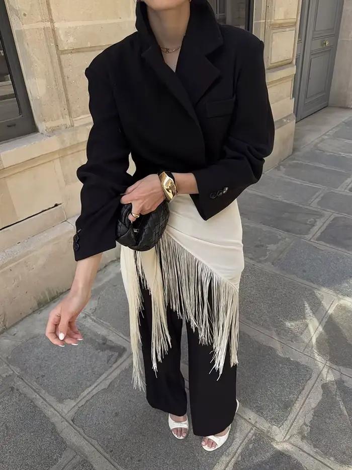 Jupe courte beige à franges
