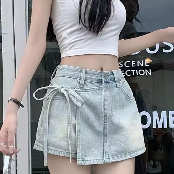 Mode noeud papillon a-ligne Denim jupes femmes coréen asymétrique fendu bleu jupe dames été nouveau basique taille haute