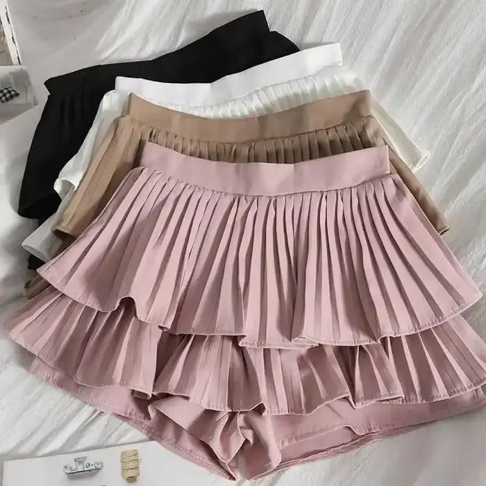 Jupe mini plissée noire style grunge avec short intégré à double ceinture