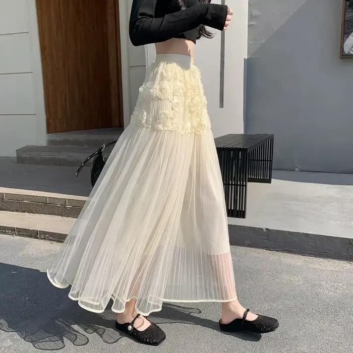 Jupe mi-longue à volants en abricot Printemps-Été 2026, Jupes élégantes et douces en maille florale pour femmes, Jupe trapèze transparente à taille haute tendance