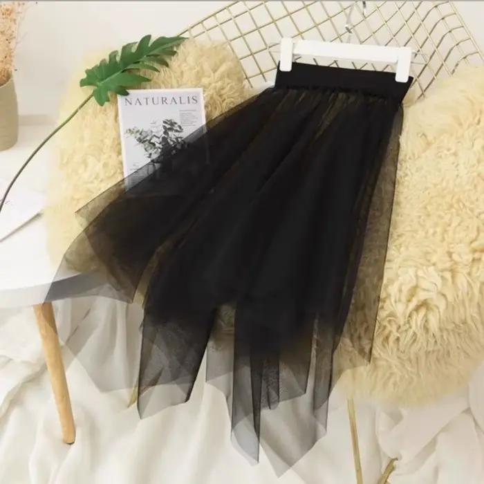 Jupe longue transparente en dentelle et tulle