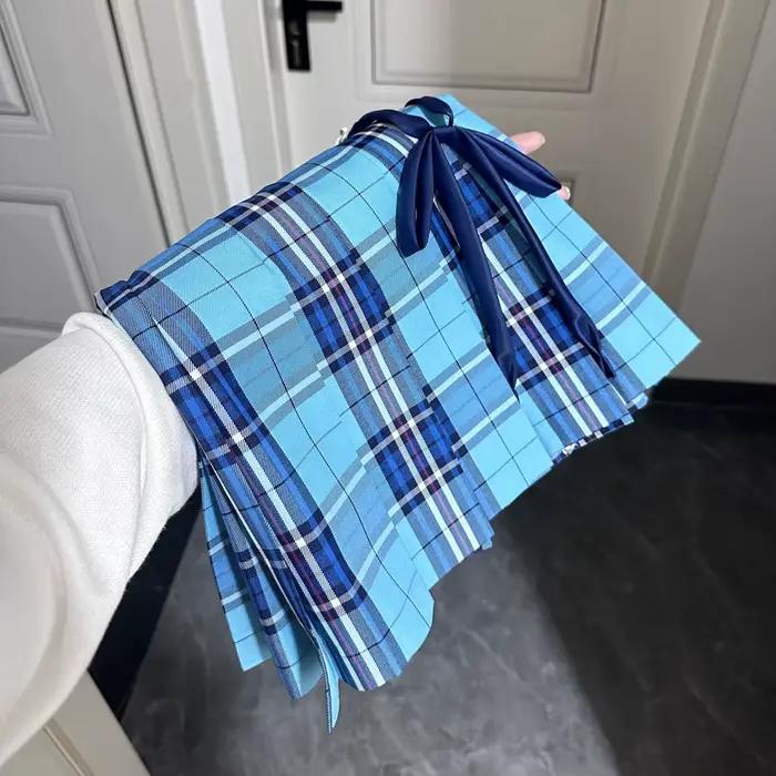 Jupes plissées à carreaux pour filles