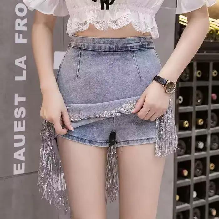 Paillettes glands jupe en jean 2025 été automne femmes paquet hanche bleu