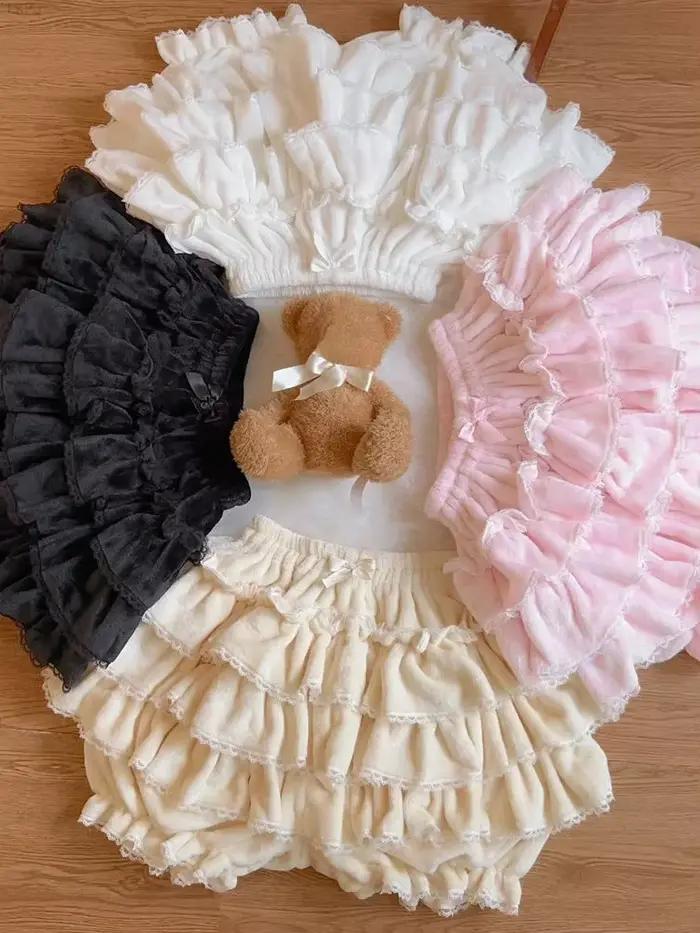 Nouveau rose japonais Kawaii Lolita jupe femmes nœud laine chaud doux Mini gâteau