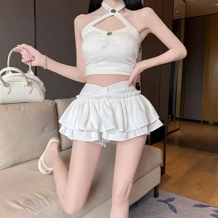 Jupe plissée bouffante Anti-culotte Flash Skort Ballet Academy Style Mini jupe évasée mignonne pour femmes Design superposé jeune