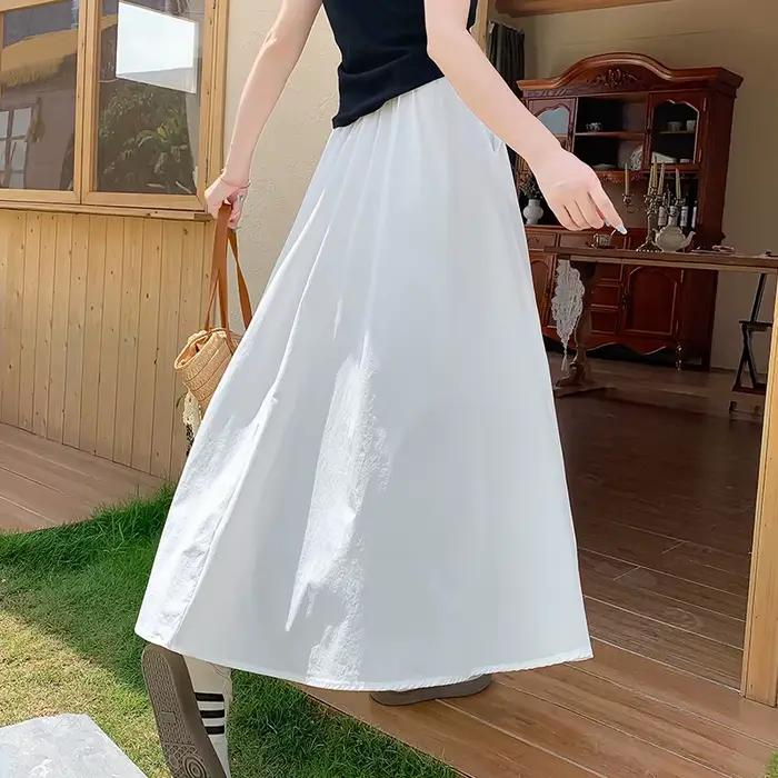 Jupe trapèze blanche avec ceinture pour femme