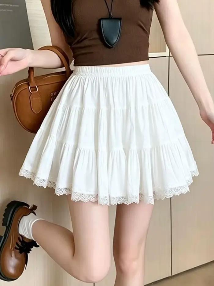 Jupe blanche Kawaii pour femme, taille haute, style chic décontracté, avec patchwork en dentelle, coupe trapèze, pour l'été, style preppy mignon