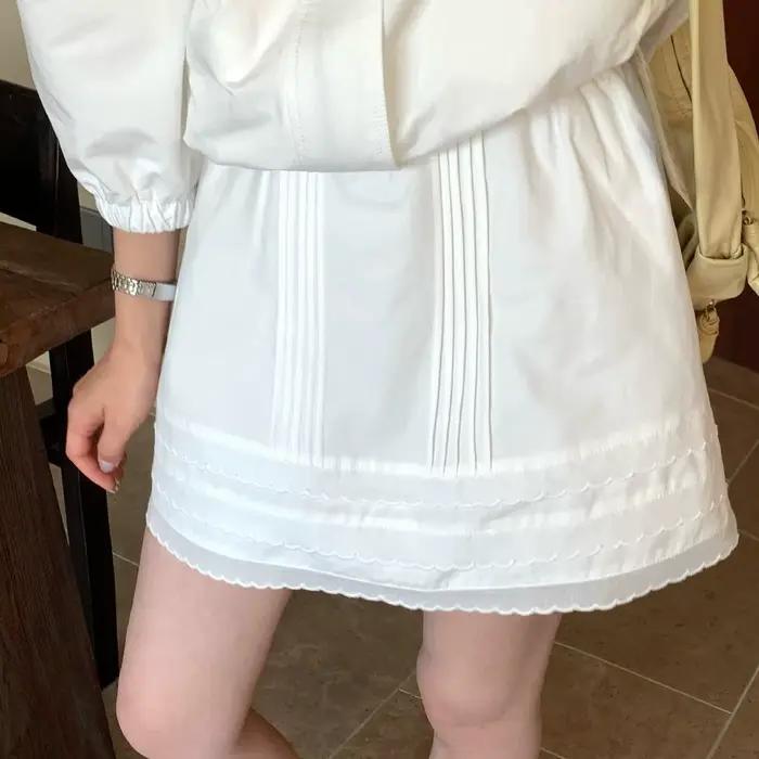 Jupe courte plissée en dentelle à taille élastique pour filles et femmes