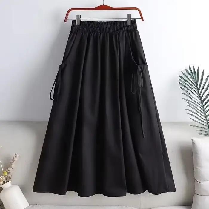 Jupe mi-longue élastique taille haute