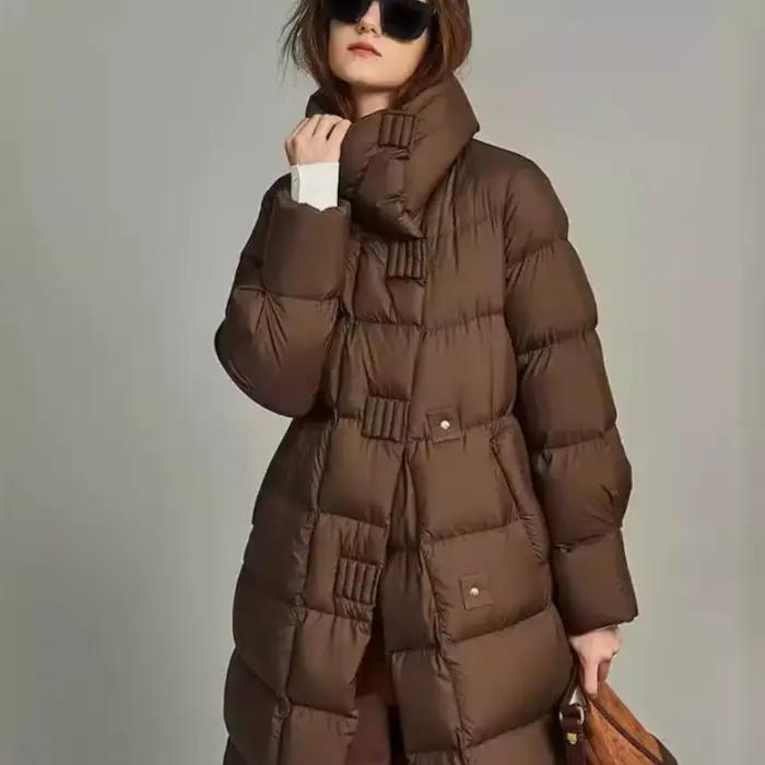 La longue veste coréenne rembourrée en coton est épaissie pour garder au chaud. Veste rembourrée en coton femme hiver en 2025