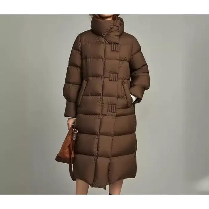La longue veste coréenne rembourrée en coton est épaissie pour garder au chaud. Veste rembourrée en coton femme hiver en 2025