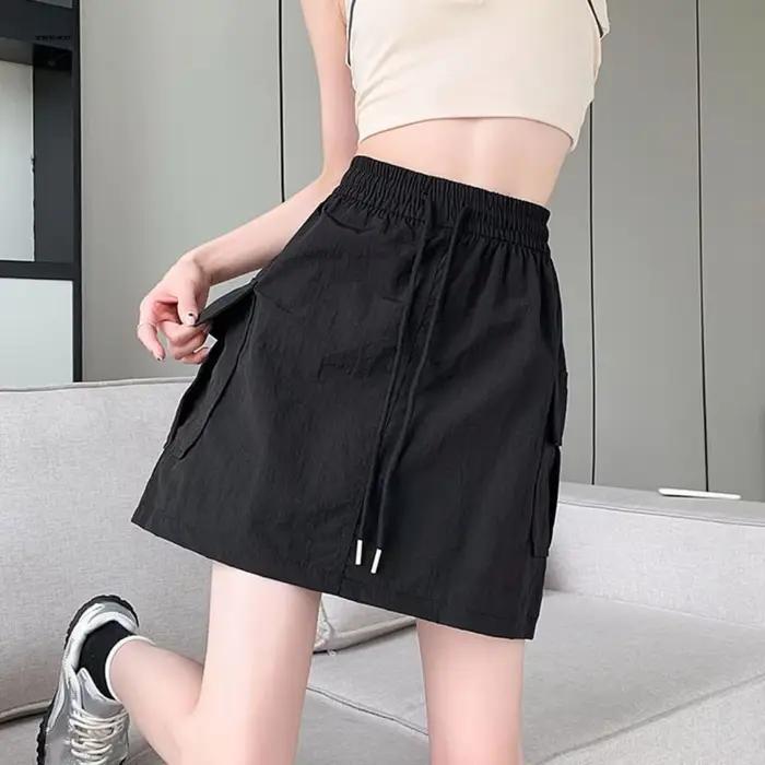 Jupe cargo ample taille haute à lacets et grandes poches, style streetwear pour femme, coupe mi-longue, style Spicy Girl