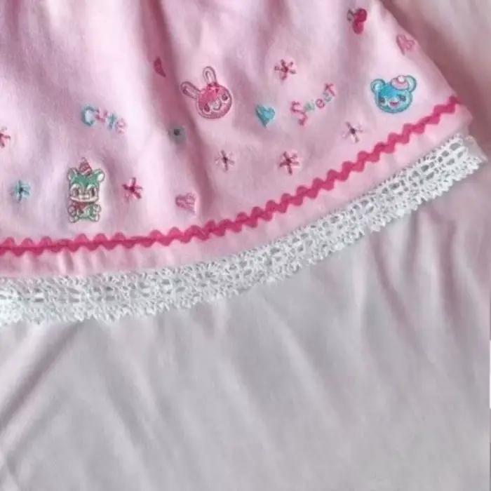 Jupe mini japonaise kawaii brodée style dessin animé patchwork de dentelle pour femme style JK esthétique Y2K sweet grunge printemps 2026