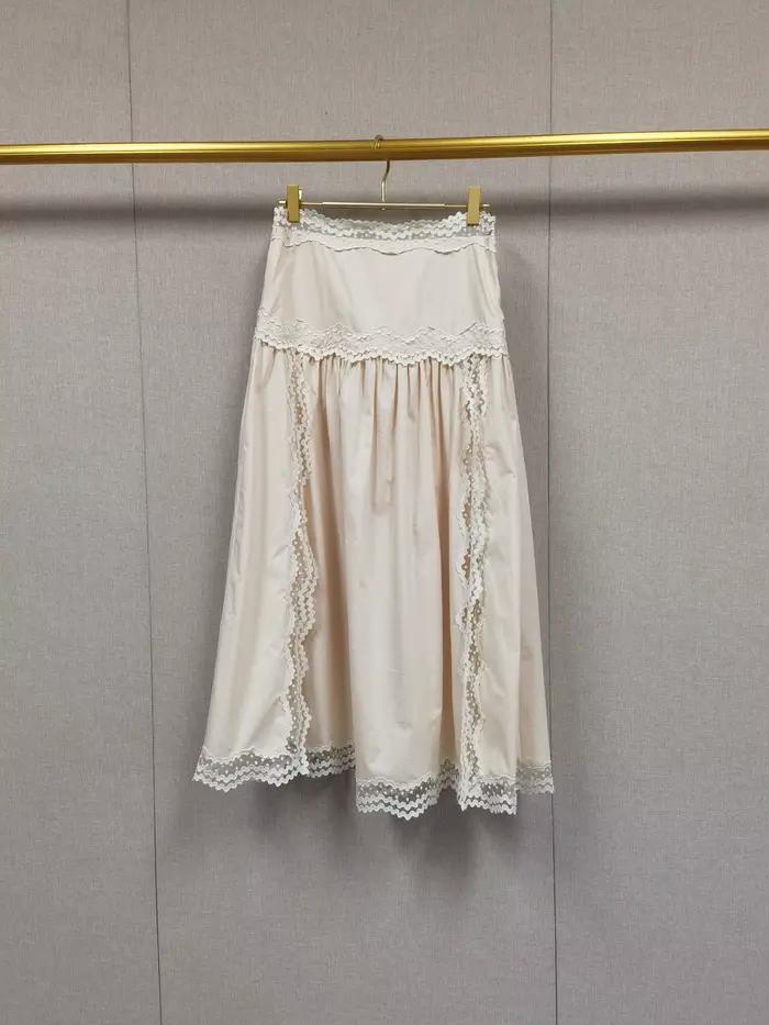 Jupe mi-longue évasée à taille haute pour femme avec bordure en dentelle ou débardeur court sans manches à épaules