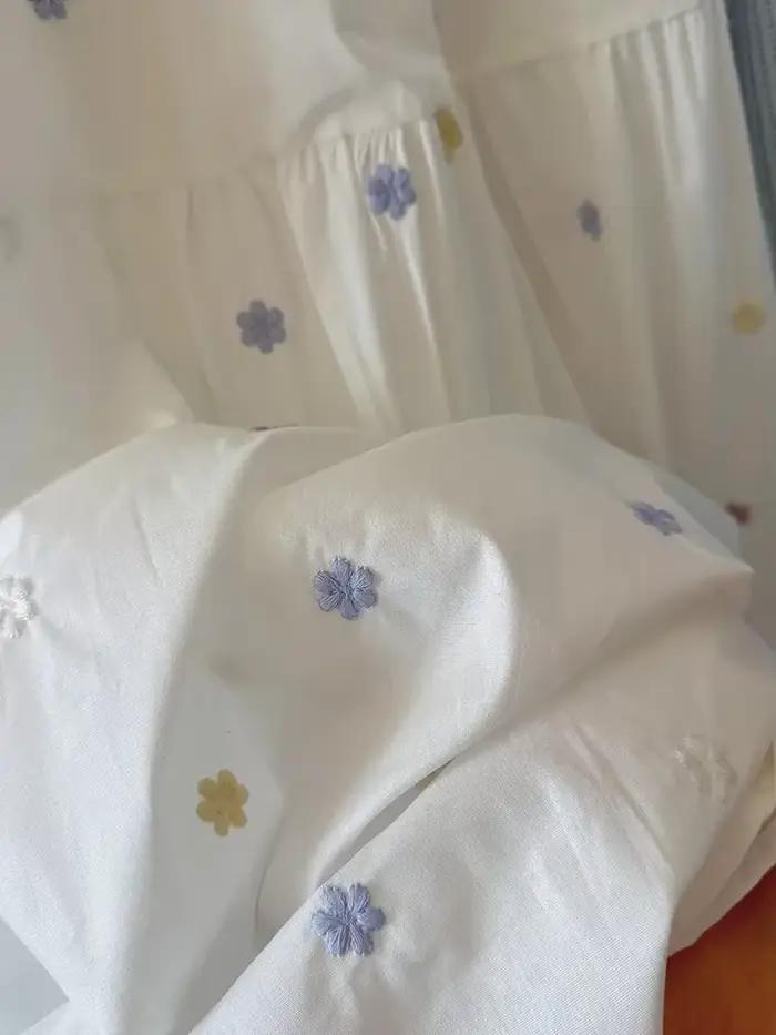 Jupes mi-longues brodées de fleurs douces pour femmes